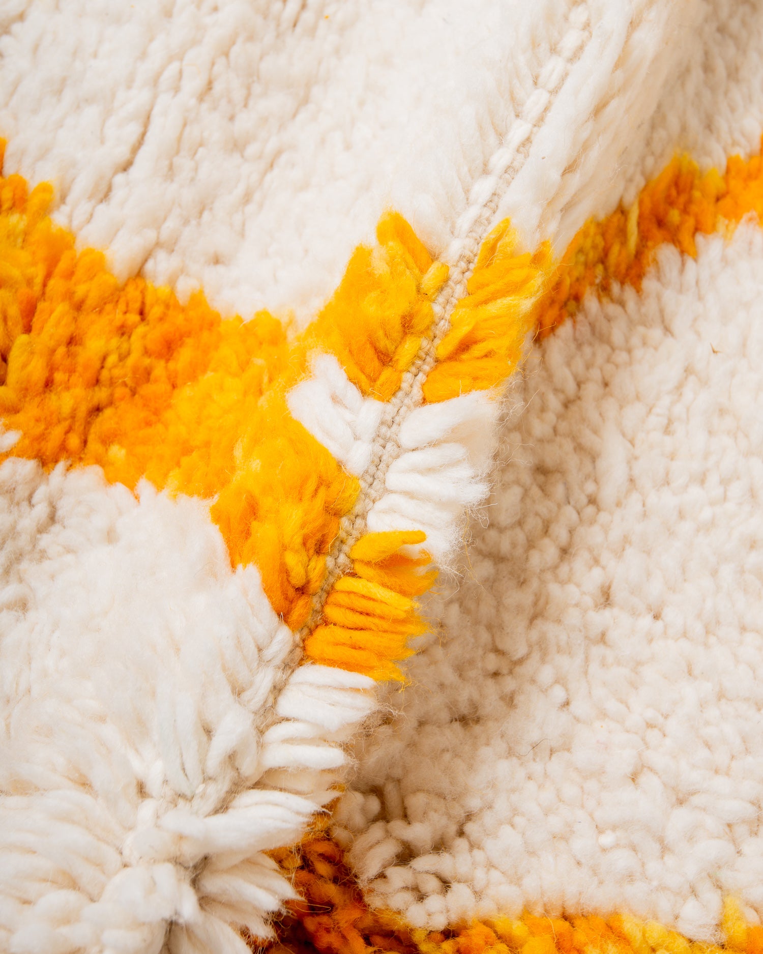Modern, designer, handcrafted Berber rug from Morocco. Beniourain carpet with beautiful colours and patterns and fluffy wool texture.